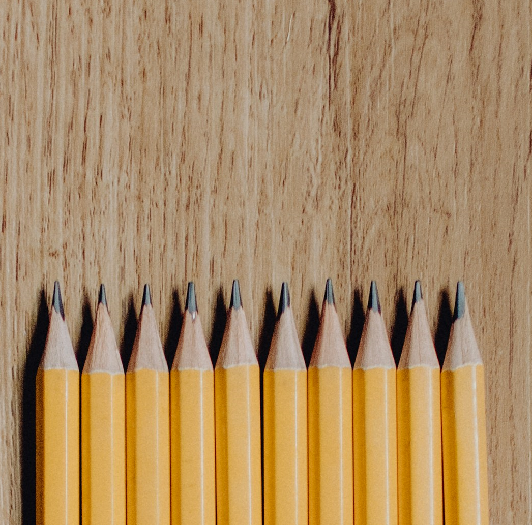 Sharpened pencils on wooden surface